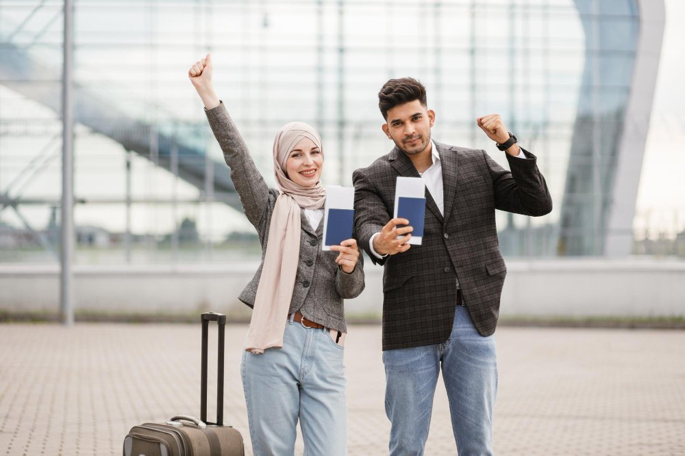 Muslim couple posing on camera outside airport demonstrating their passport