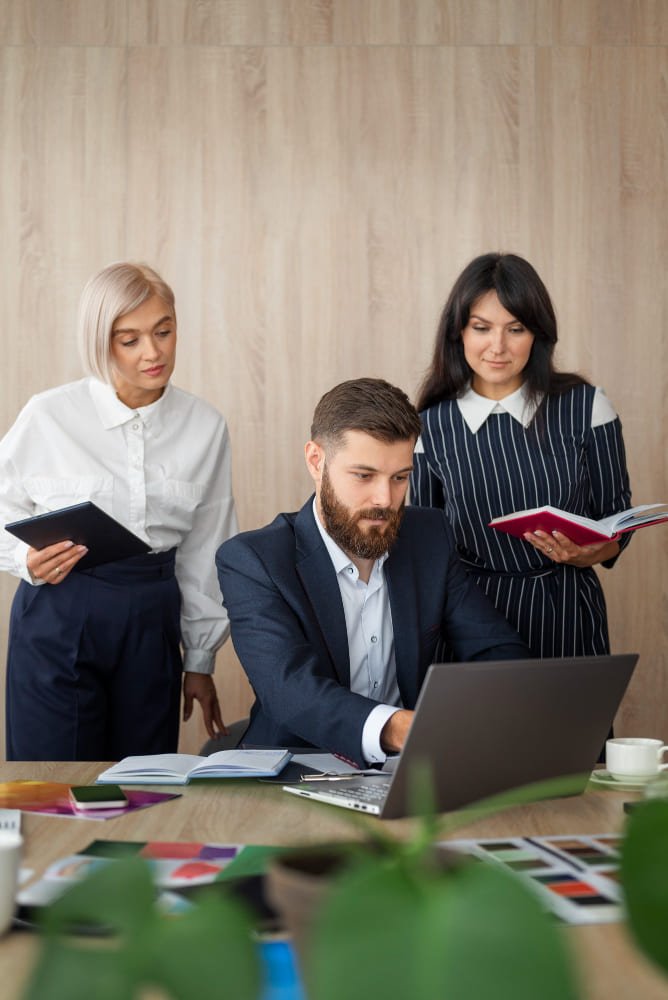 Medium shot people working in office